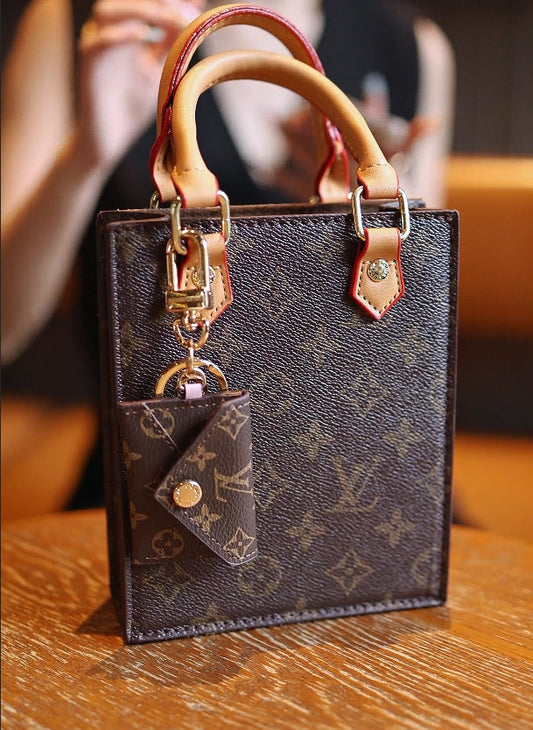 Designer LV Keychain phone bag crafted by a celebrity designer Inspired